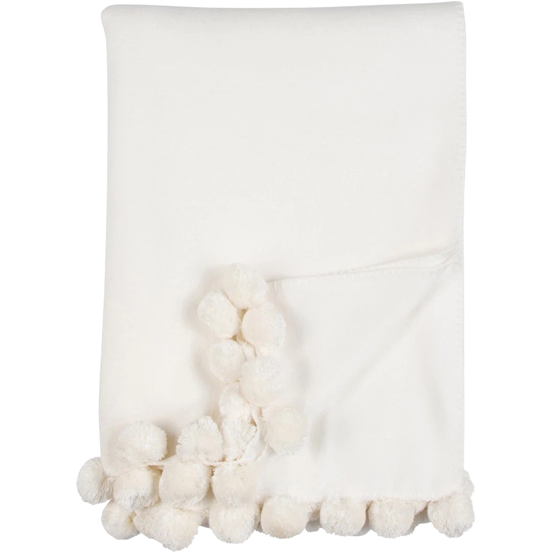 White throw with online pom poms